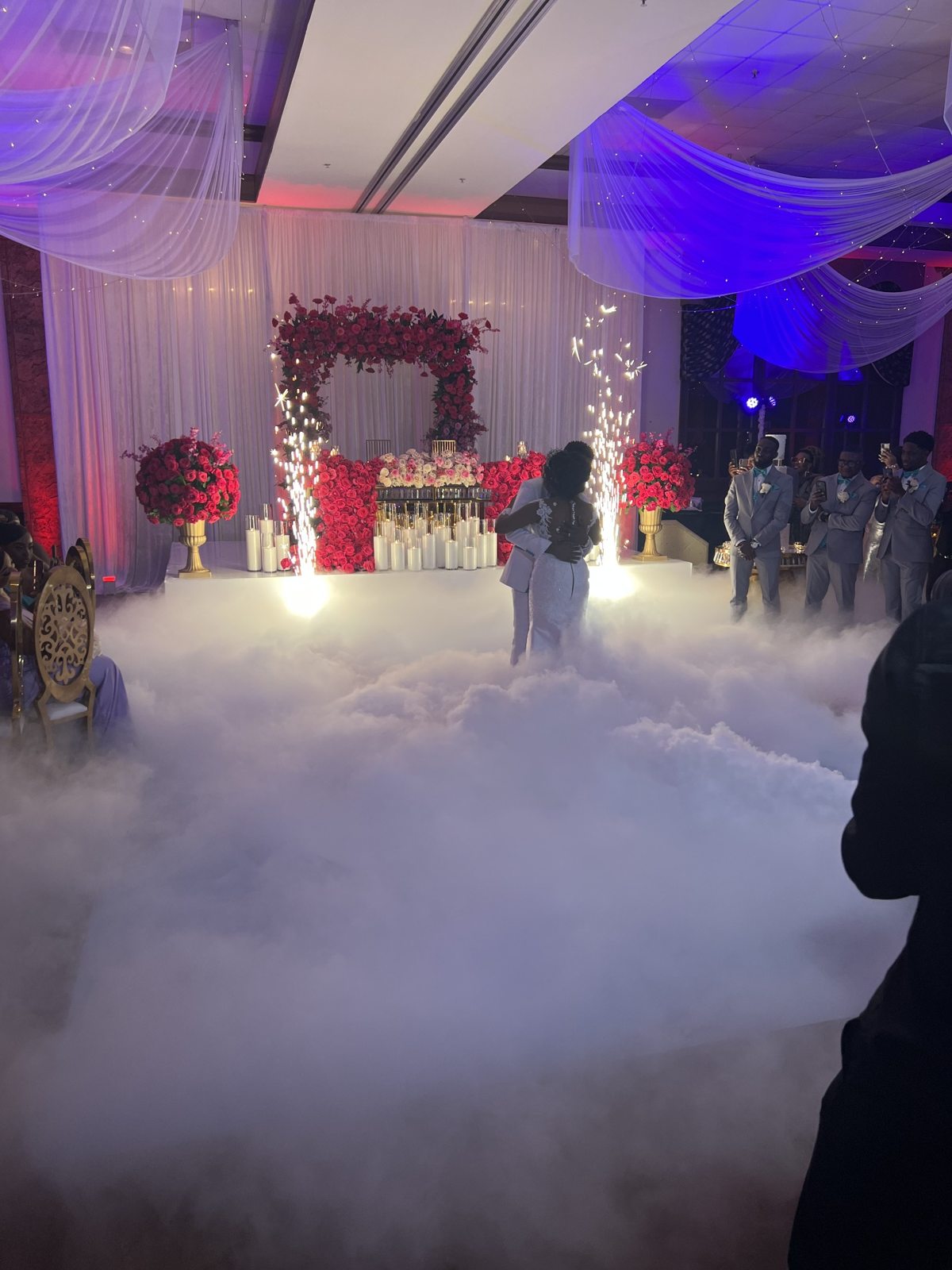 Wedding first dance with low-lying fog and spark effects